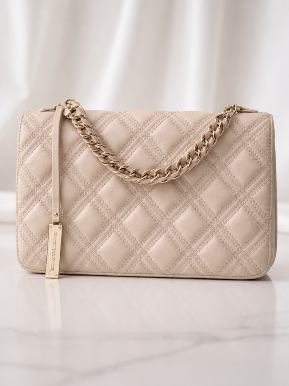 Charles & Keith Small Quilted Vegan Leather Chain Top Handle Bag in Cream